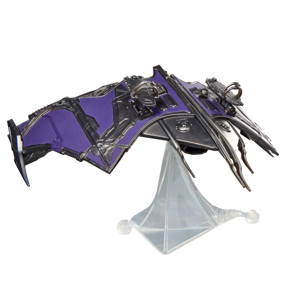 Toy spaceship model with purple and black design on a white background