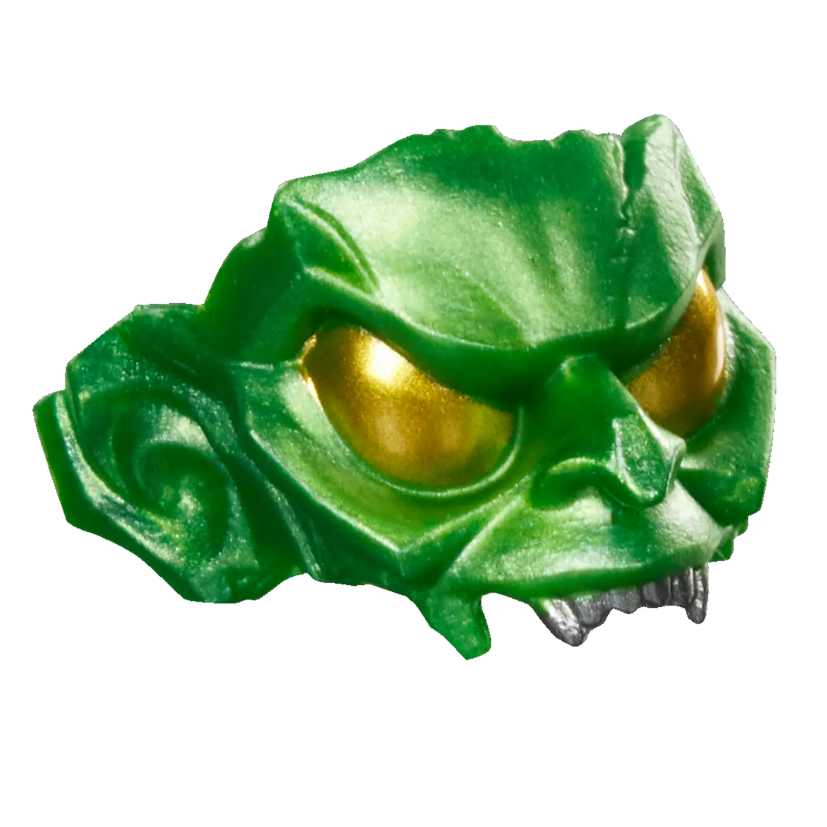 A green monster skull toy accessory with gold eyes and silver teeth, isolated on a white background.
